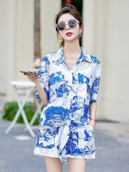 Fashionable casual short-sleeved shirt suit for women 2024 new summer vacation style loose wide-leg shorts two-piece set