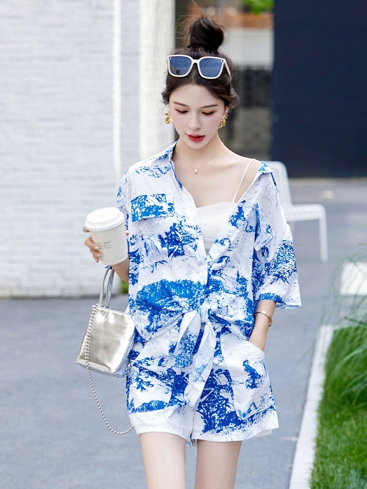 Fashionable casual short-sleeved shirt suit for women 2024 new summer vacation style loose wide-leg shorts two-piece set