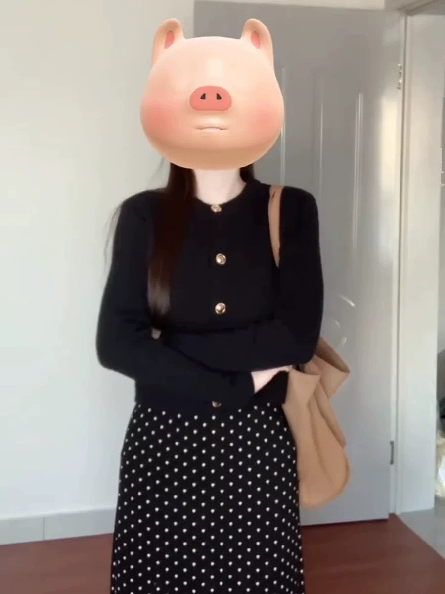Korean chic two-piece set for early autumn 2025: knitted cardigan sweater and retro polka dot maxi skirt.
