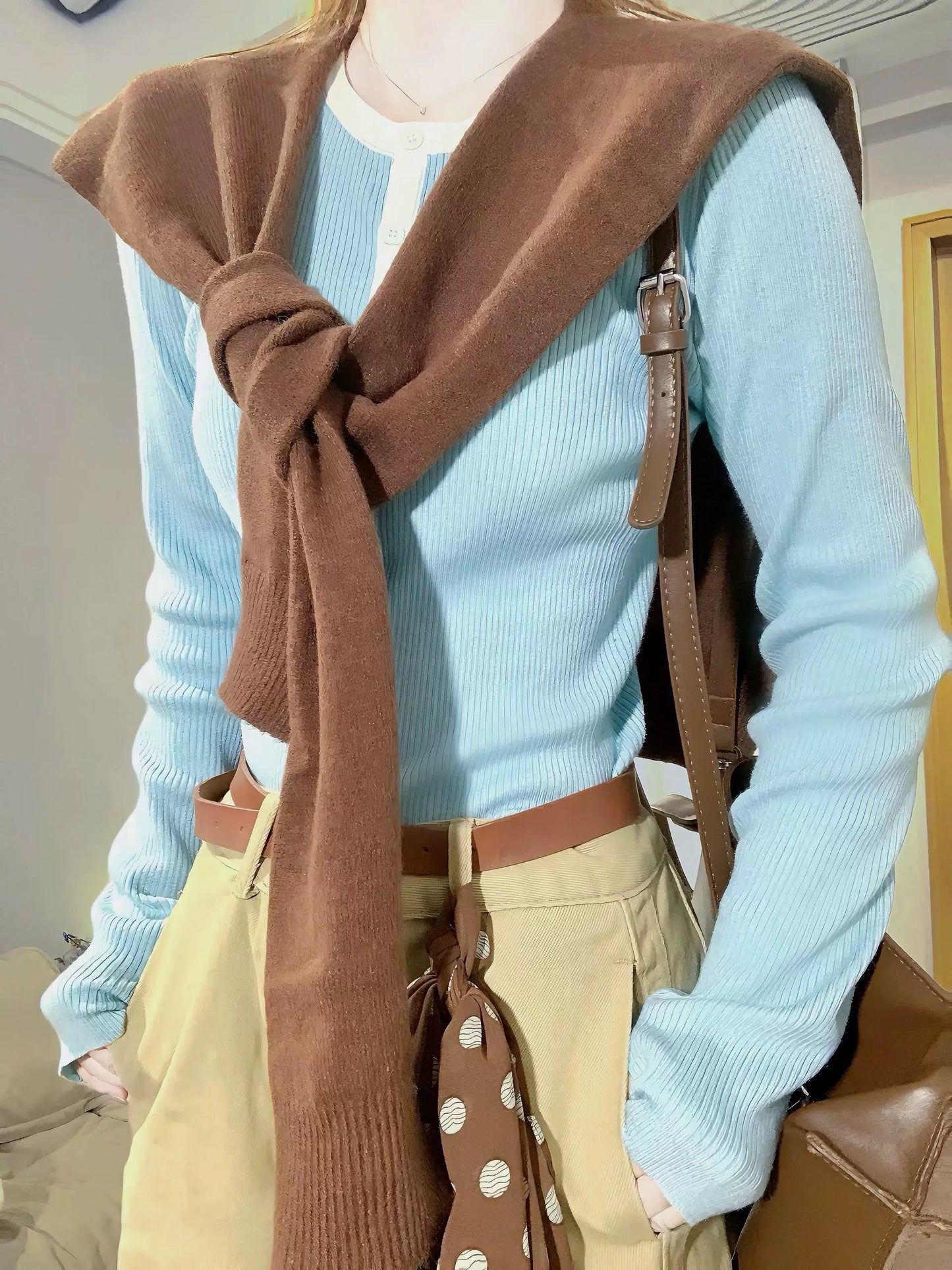 A gorgeous early autumn set of blue shawl knit top and pants, a Korean style women's outfit.