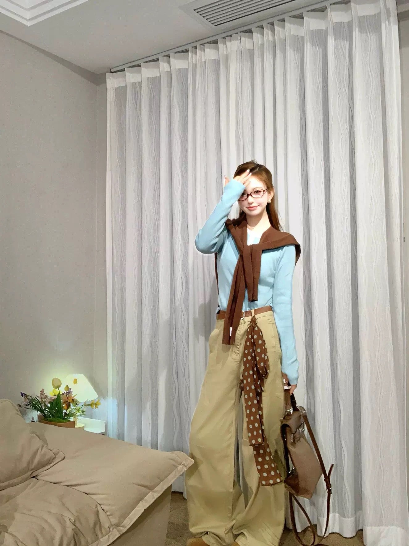 A gorgeous early autumn set of blue shawl knit top and pants, a Korean style women's outfit.