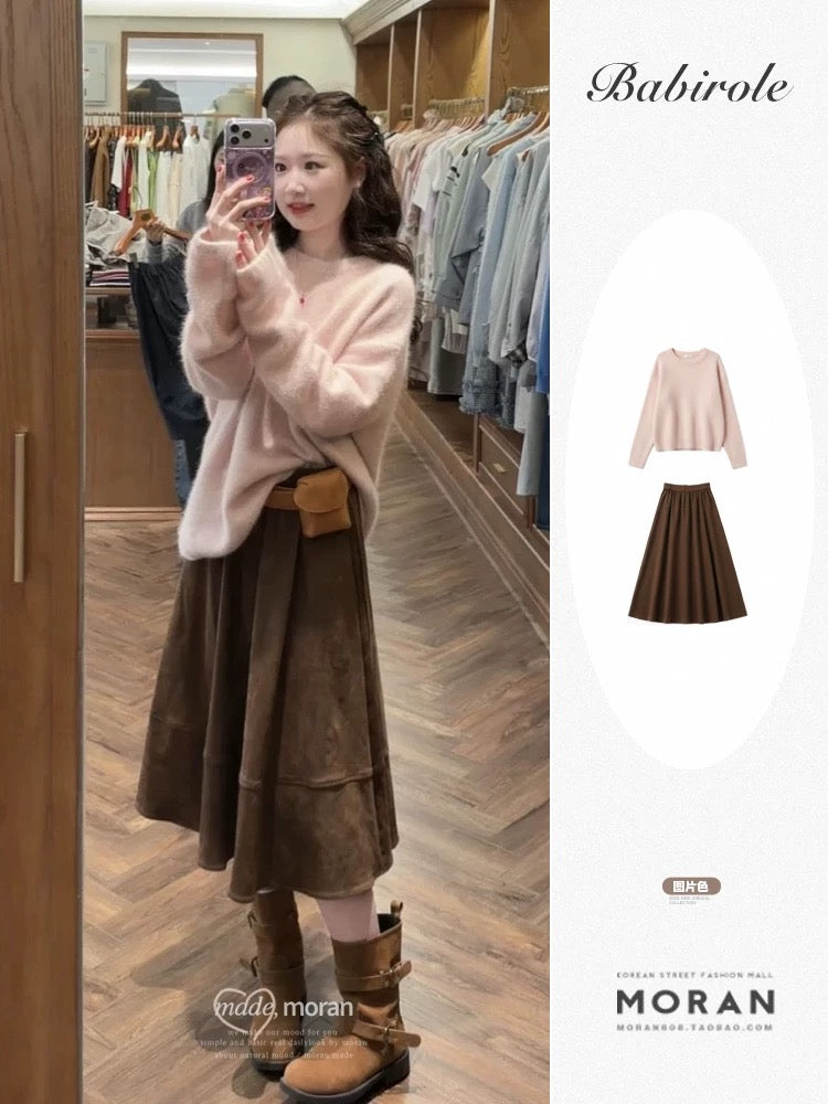 Soft, creamy pink pullover sweater and a relaxed, chic skirt set for petite women, perfect for autumn and winter.