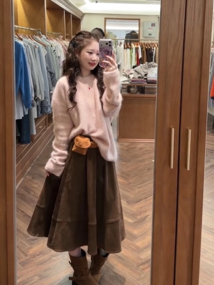 Soft, creamy pink pullover sweater and a relaxed, chic skirt set for petite women, perfect for autumn and winter.