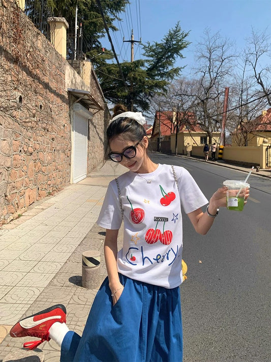 CCKOK Cherry Letter Printed Straight Shoulder T-shirt 2025 Summer New Korean Version All-match White Loose Short Sleeve Women