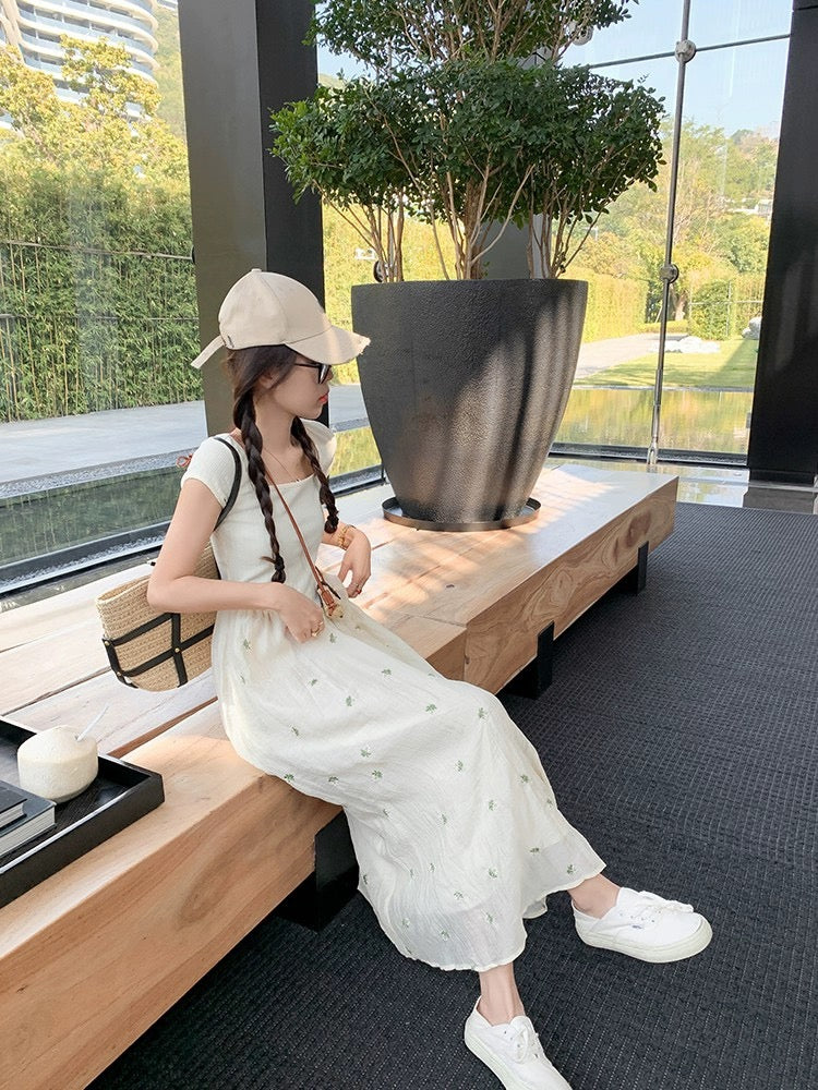 Zeng Xiaoxian sweet and lovely apricot color spliced floral short-sleeved dress for women in spring and summer, gentle and slimming A-line long skirt