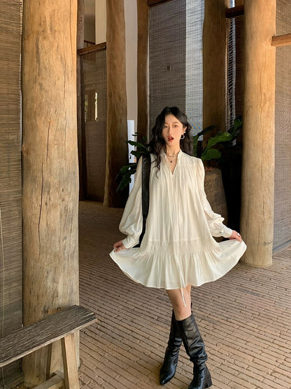 Ren Xiaoyi 2024 spring new white short skirt pleated large swing lace-up dress V-neck loose baby doll skirt