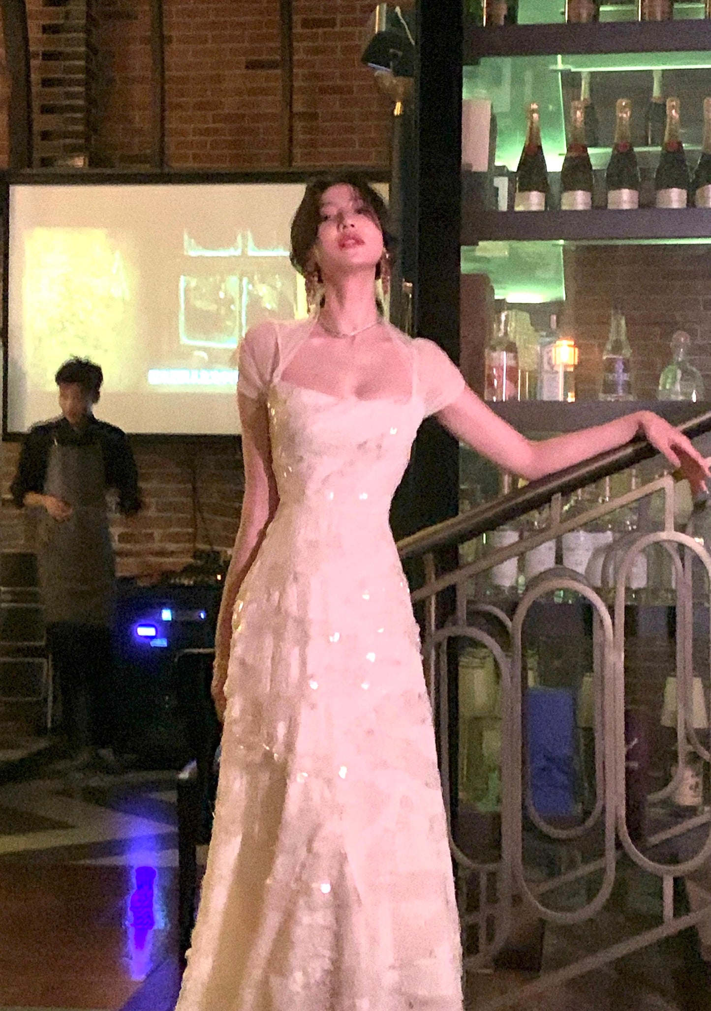 Wan's elegant and ethereal white fishtail dress with sequins, perfect for an evening gown. A new high-end style for autumn 2024.