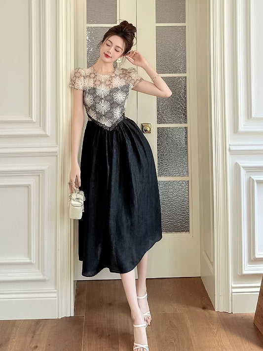 Light luxury high-end dress women 2025 summer mid-length black lace splicing high waist slim A-line long skirt