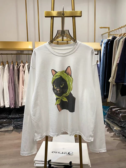 [Real-life shot from Xiao Ai's shop] Autumn 2026 Korean-style loose-fit long-sleeve sweatshirt for women featuring a quirky cat print—a youthful, flattering top.