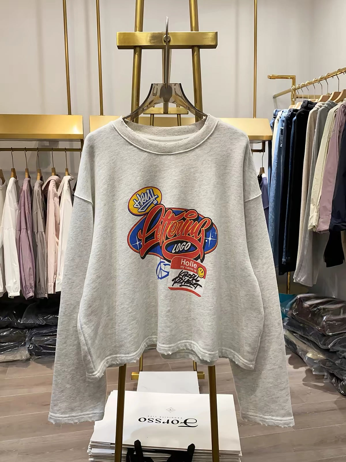 [Real-life photos from Xiao Ai's shop] Women's casual autumn sweatshirt featuring a cartoon letter print, crew neck, long sleeves, and a loose fit.
