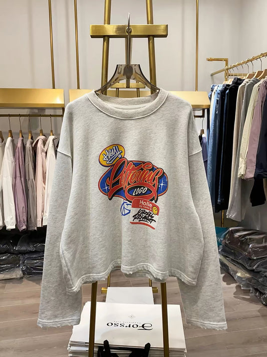 [Real-life photos from Xiao Ai's shop] Women's casual autumn sweatshirt featuring a cartoon letter print, crew neck, long sleeves, and a loose fit.