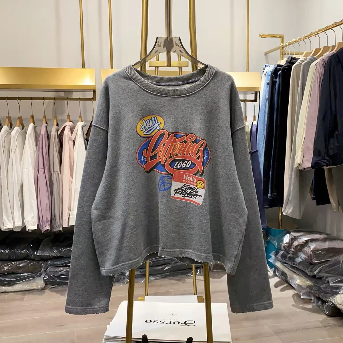[Real-life photos from Xiao Ai's shop] Women's casual autumn sweatshirt featuring a cartoon letter print, crew neck, long sleeves, and a loose fit.