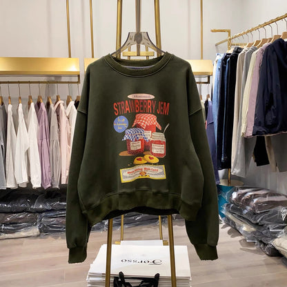[Real-life photos from Xiao Ai's shop] New for Autumn 2026: Loose-fitting, slimming, casual long-sleeve top with strawberry jam print.