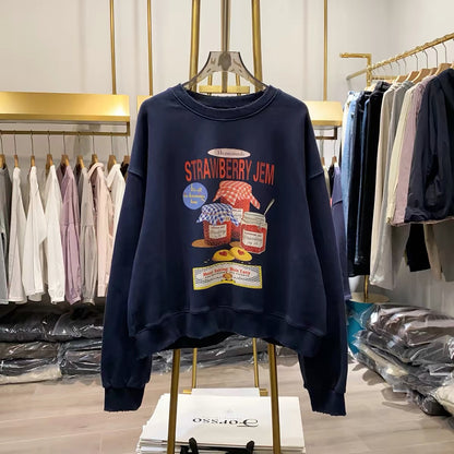 [Real-life photos from Xiao Ai's shop] New for Autumn 2026: Loose-fitting, slimming, casual long-sleeve top with strawberry jam print.