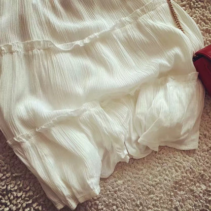 Beach holiday little white dress Cascading ruffled white suspender dress for women