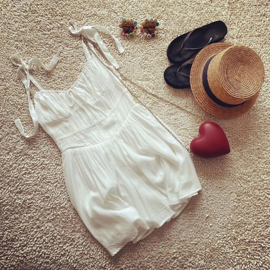 European and American style French retro white small fresh solid color waist suspender skirt for women on vacation