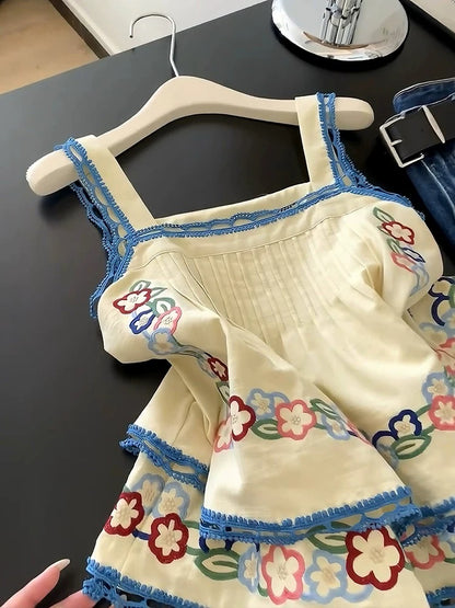 Fashionable and stylish yellow design hollow stitching suspenders for women in summer niche age-reducing embroidered pleated vest top