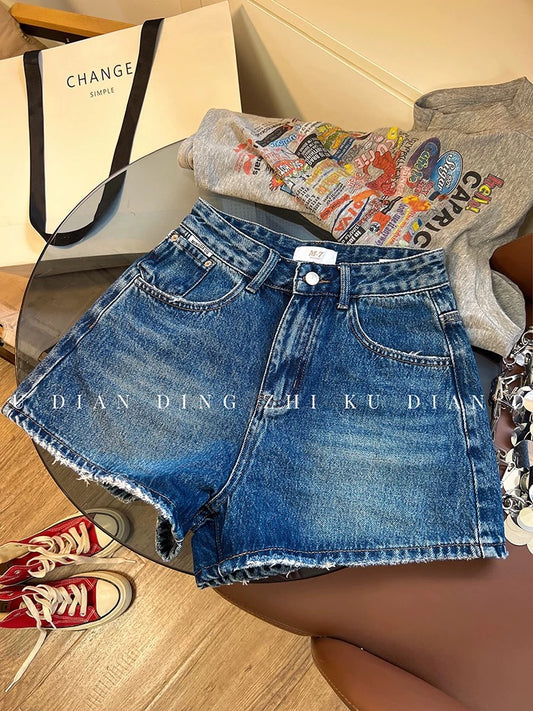 High-end color! Women's distressed denim shorts, 2026 summer Korean style, high-waisted A-line, slimming wide-leg hot pants, stylish and chic.