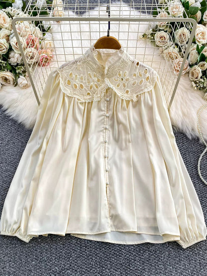 Retro-style court-inspired hollowed-out lace stand-collar shirt for women, new 2025 style, casual, versatile, Korean-inspired, gentle look.