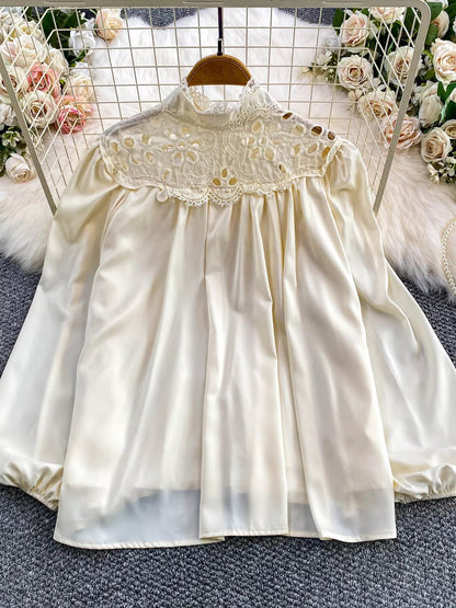 Retro-style court-inspired hollowed-out lace stand-collar shirt for women, new 2025 style, casual, versatile, Korean-inspired, gentle look.