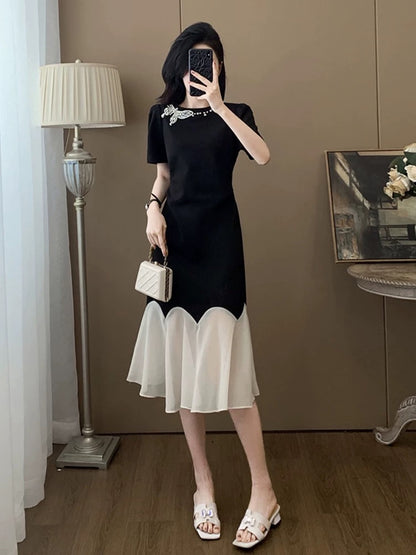 Black short-sleeved dress for women summer 2025 new style this year popular style temperament splicing niche no collision style skirt