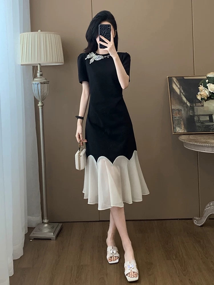 Black short-sleeved dress for women summer 2025 new style this year popular style temperament splicing niche no collision style skirt