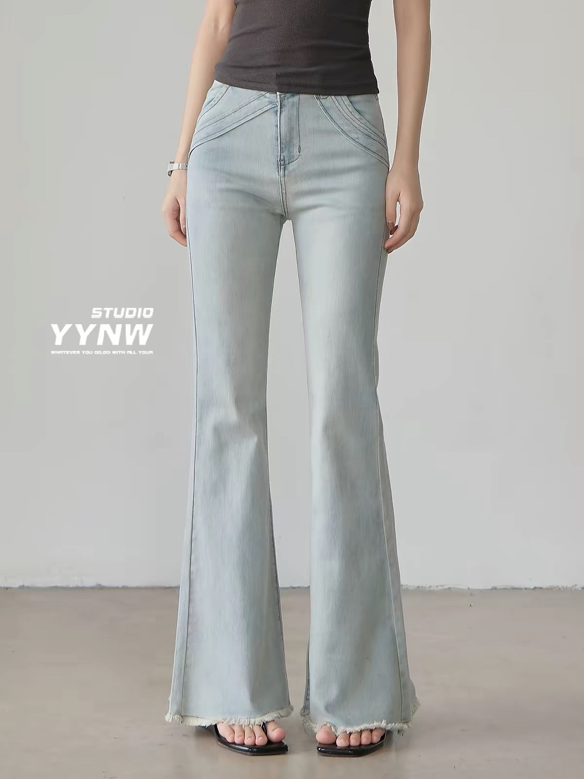 Women's American-style light blue raw-hem slight-flare jeans (2026 new summer collection): high-waisted, slim-fit, and flattering full-length bootcut style.