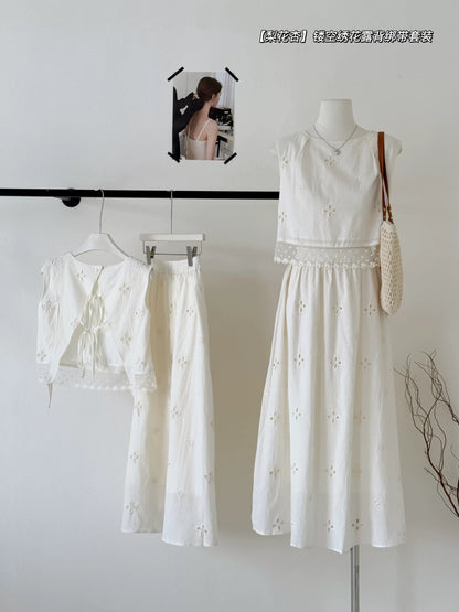 Summer new style small sleeveless top hollow embroidery backless strap vest + A-line skirt skirt suit female