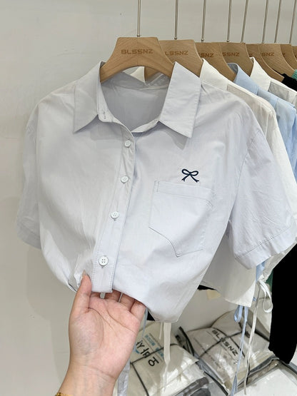 Embroidered polo collar white right shoulder short-sleeved shirt for women 2024 new summer design loose shirt top trendy