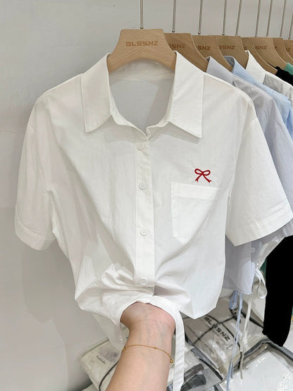 Embroidered polo collar white right shoulder short-sleeved shirt for women 2024 new summer design loose shirt top trendy