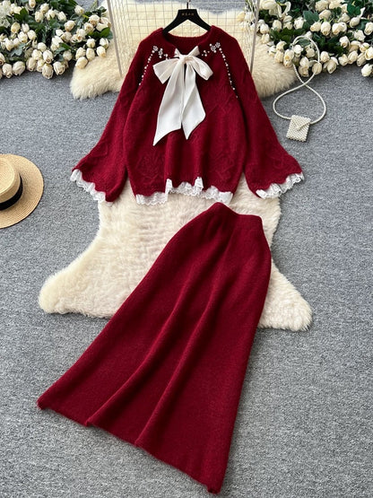 Gentle and sweet Korean style autumn two-piece set with bow, featuring a sweater and high-waisted skirt.