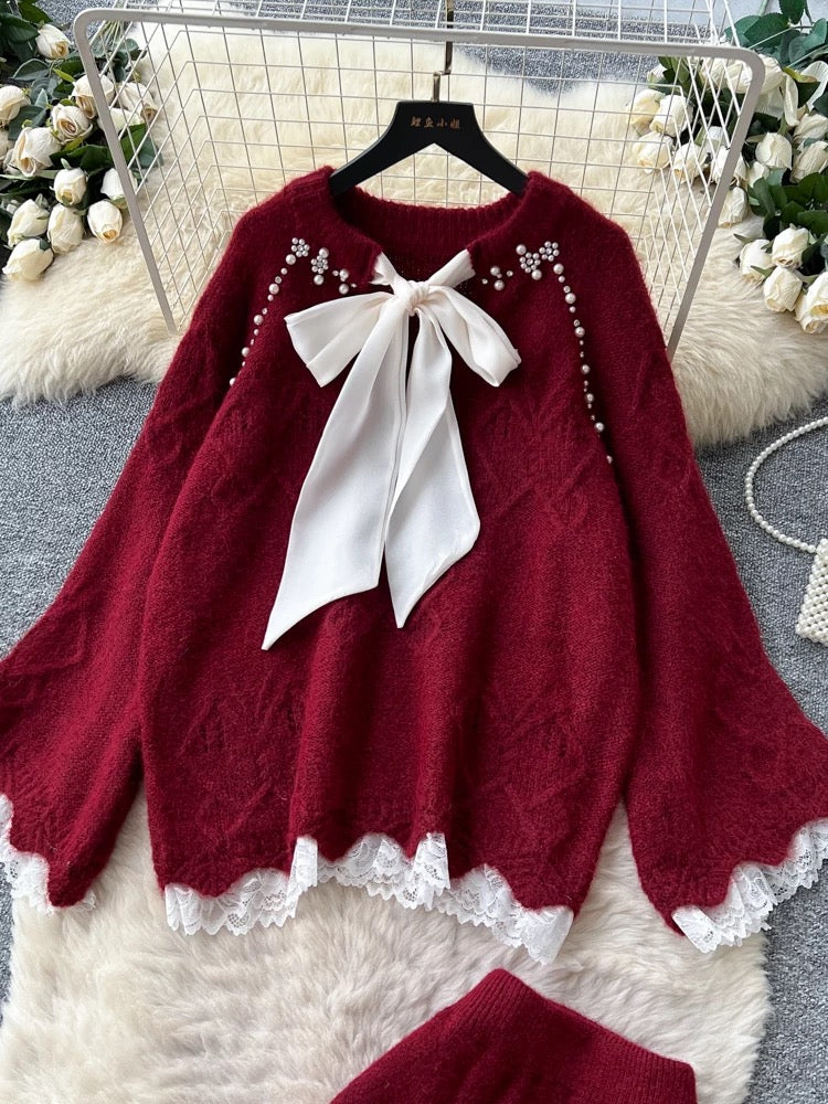 Gentle and sweet Korean style autumn two-piece set with bow, featuring a sweater and high-waisted skirt.