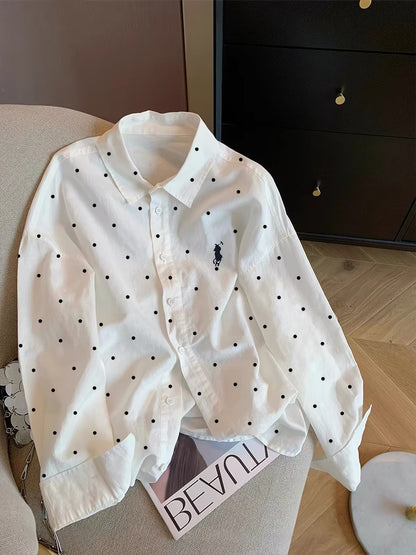 Women's French-style chic white polka-dot long-sleeve shirt with a polo collar; a lightweight, relaxed-fit piece suitable for summer as a shirt or light outer layer.