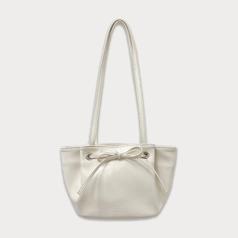 somewherebutterKorean niche dumpling bag bow shoulder handbag commuter armpit bag for women