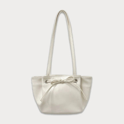 somewherebutterKorean niche dumpling bag bow shoulder handbag commuter armpit bag for women