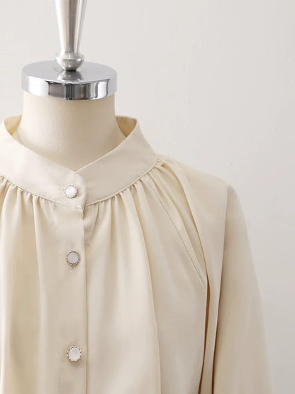 Retro French apricot stand collar lantern sleeve satin shirt female 2025 spring and autumn new drape niche top
