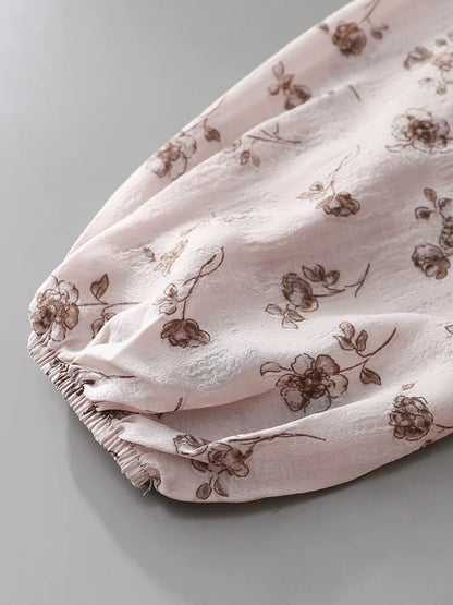 French light mature style all-match v-neck long-sleeved shirt women's 2025 single-breasted ruffled lace-up printed top