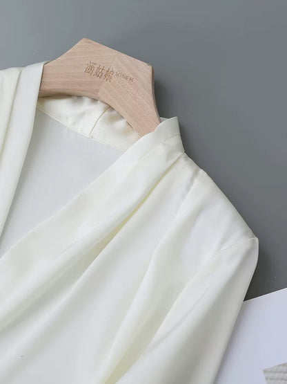 Drape satin apricot high-end shirt women's long sleeve 2025 spring and autumn niche V-neck design sense professional shirt