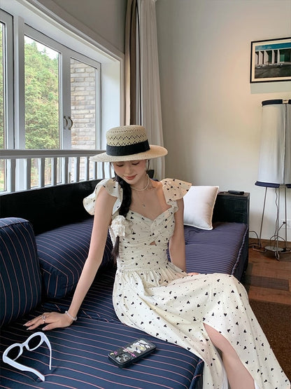 Huang Yili NORA STUDIO polka dot small flying sleeve waist dress female summer design temperament long skirt