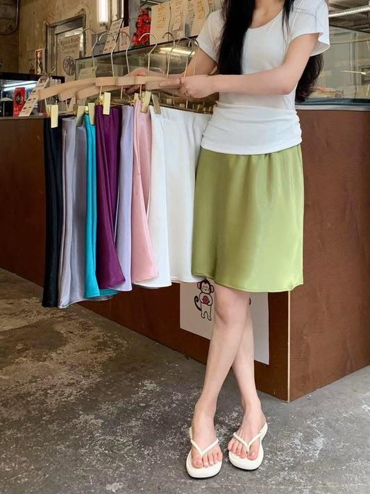 French-style apricot satin midi skirt for women, perfect for summer, sophisticated acetate midi skirt, versatile and slimming A-line skirt.
