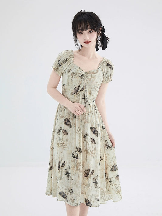 Shallot's well-tailored butterfly print textured dress, mid-length summer waist-cinching puff sleeves, sweet A-line skirt