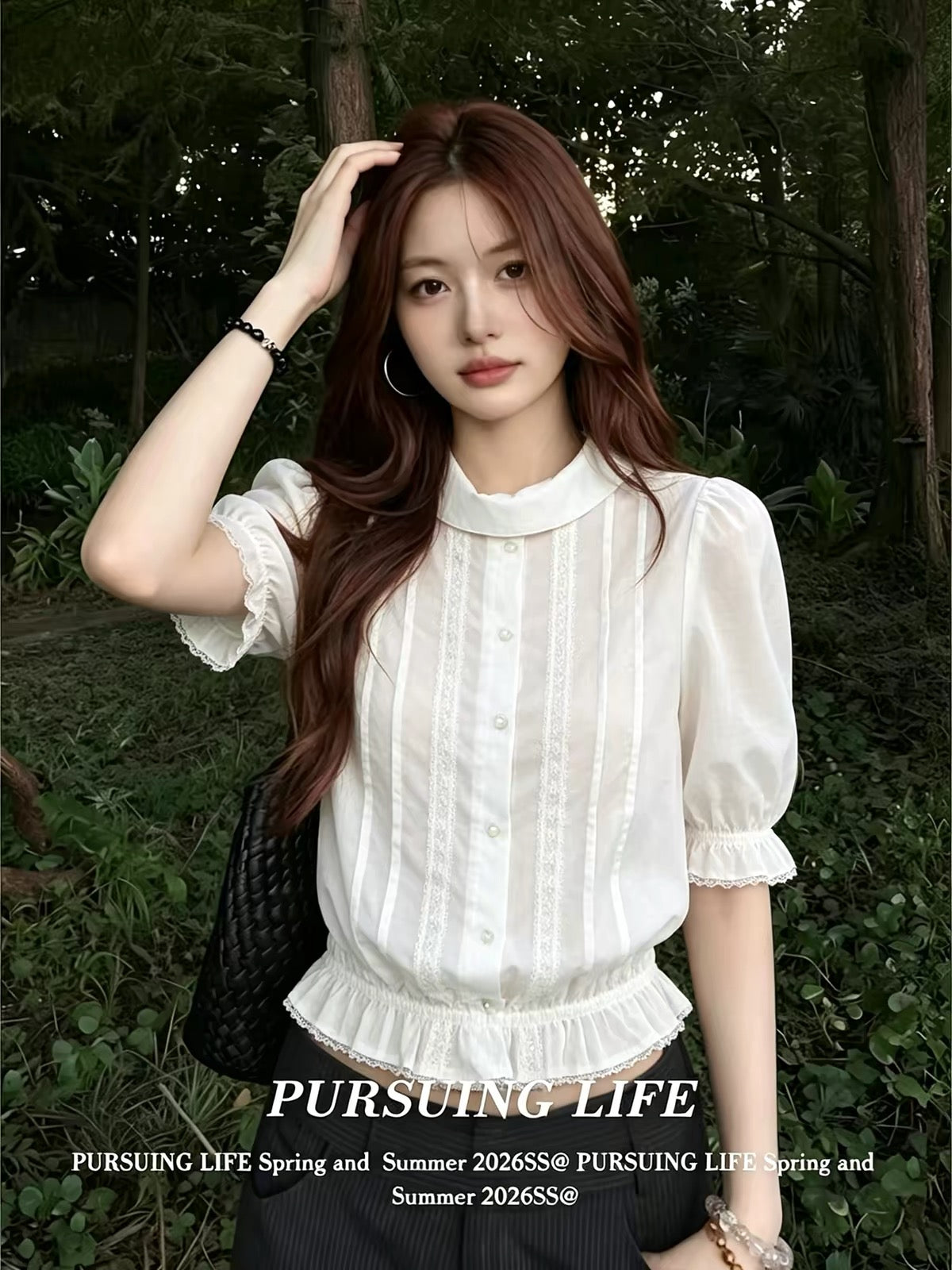 Women's French-style white collared "faux-layered" shirt; a stylish summer top featuring a fitted waist, slimming silhouette, pleated detailing, and three-quarter sleeves.