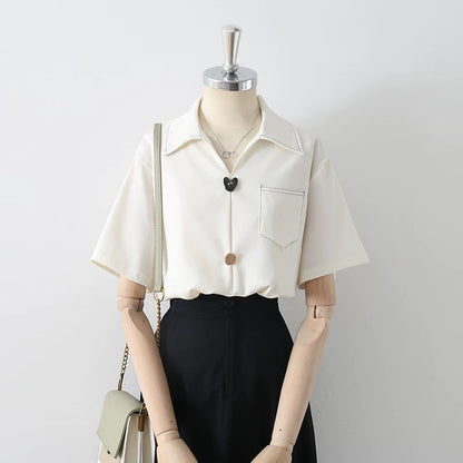 Summer women's clothing new French high-end professional OL apricot shirt female niche button temperament V-neck chic top