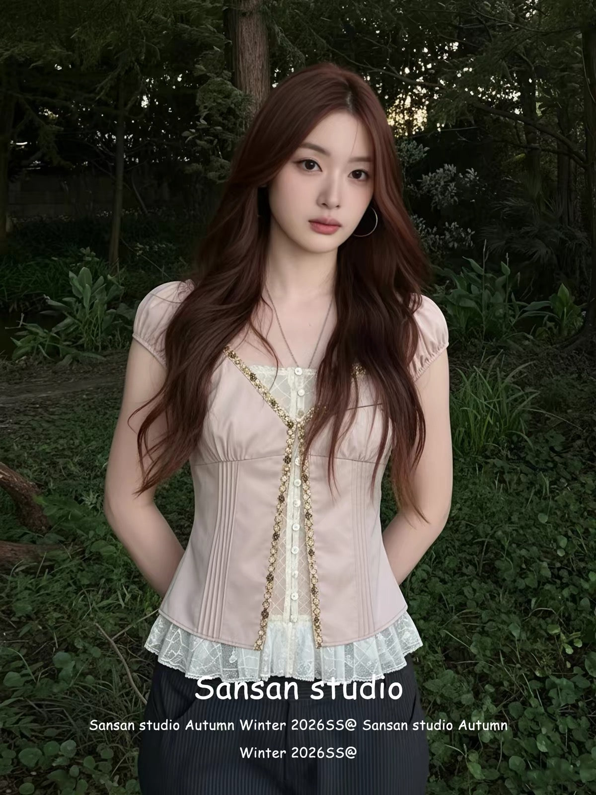 Women's pink short-sleeved "faux-layered" blouse—a slimming, Korean-style summer top featuring scalloped lace detailing.