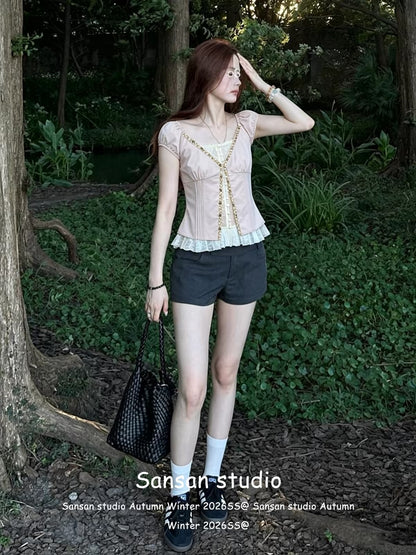 Women's pink short-sleeved "faux-layered" blouse—a slimming, Korean-style summer top featuring scalloped lace detailing.