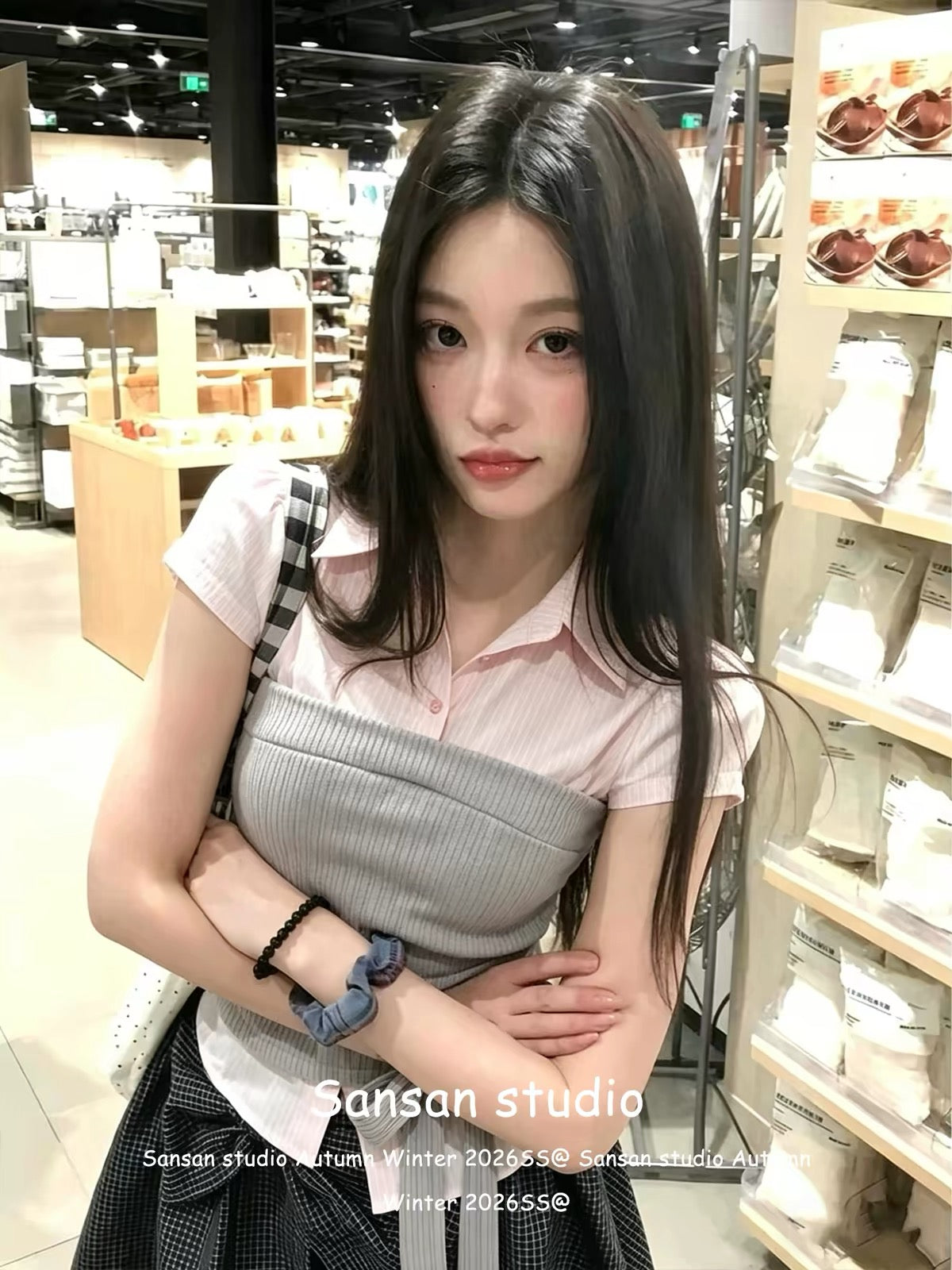 Korean-style "faux-layered" short-sleeve shirt for women—a pink, fitted, waist-cinching top featuring a structured shoulder cut and trendy lace-up detailing for a stylish, edgy look.