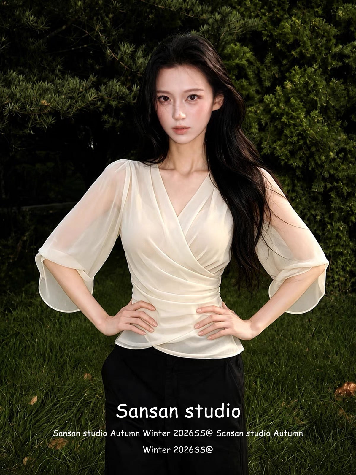 Women's French-style V-neck chiffon blouse with mid-length sleeves—a chic, waist-cinching, and slimming summer top that exudes an air of sophisticated, casual elegance.