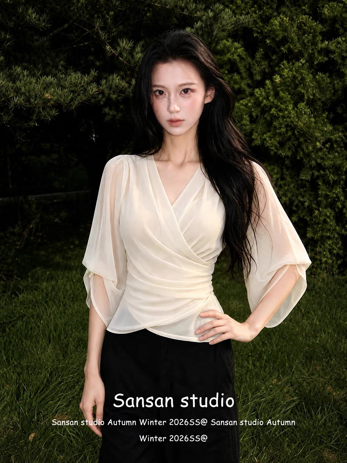 Women's French-style V-neck chiffon blouse with mid-length sleeves—a chic, waist-cinching, and slimming summer top that exudes an air of sophisticated, casual elegance.