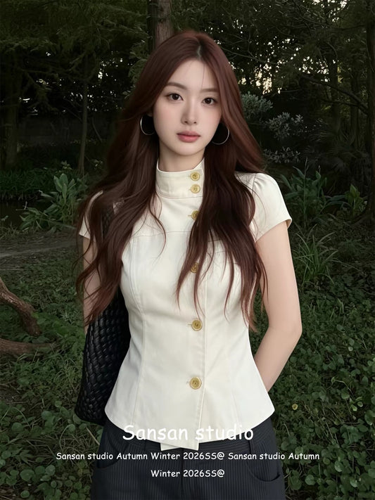 Korean-style chic short-sleeved shirt for women—a slim-fit, flattering top featuring a mock neck and a vintage-inspired aesthetic.