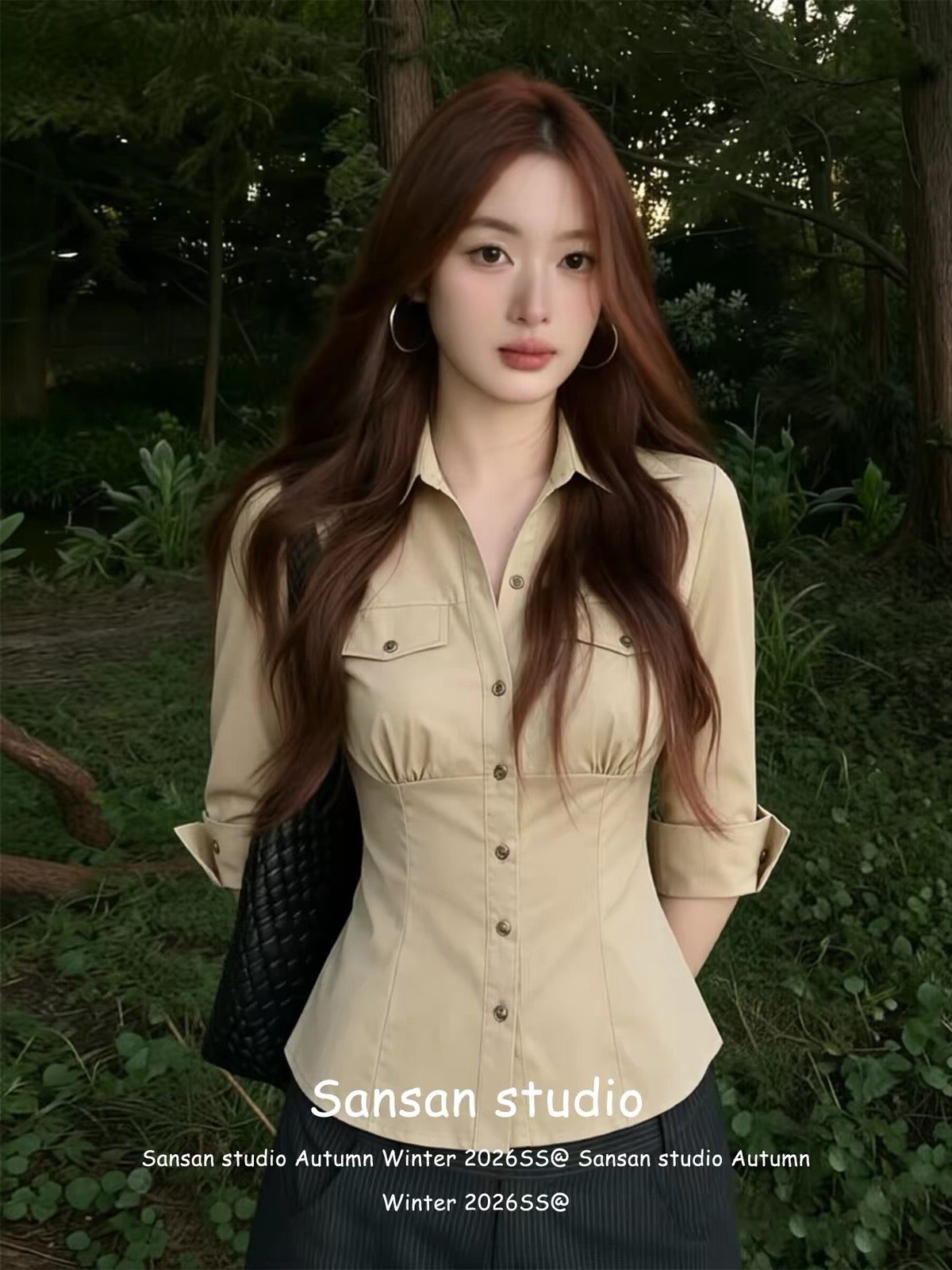 Korean-style fitted mid-sleeve shirt for women—a summer staple featuring a waist-cinching cut, pockets, and a classic collar; a slim-fit, flattering, and sophisticated top.